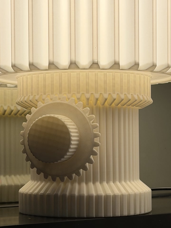 Close view of the Gear Lamp gear-shaped knob and lower shade
