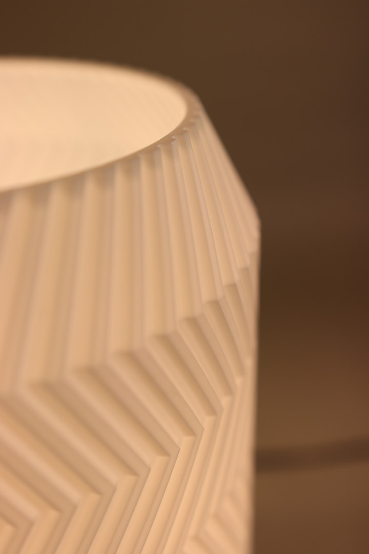 Close view of the Origami Lamp folded-chevron shade edge