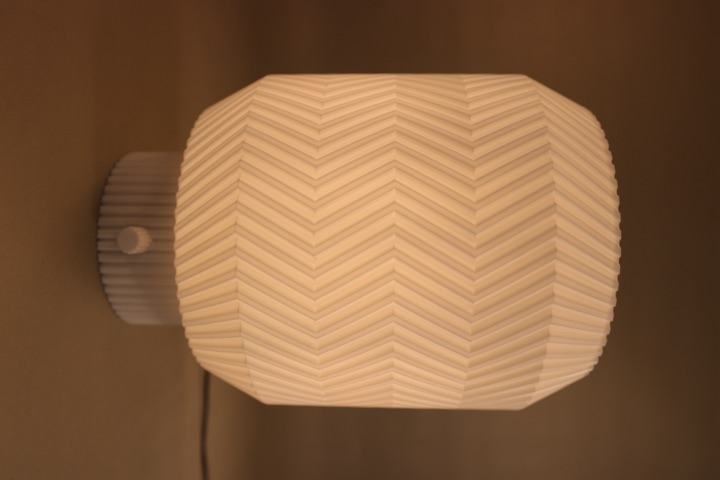 Origami Lamp glowing in warm light