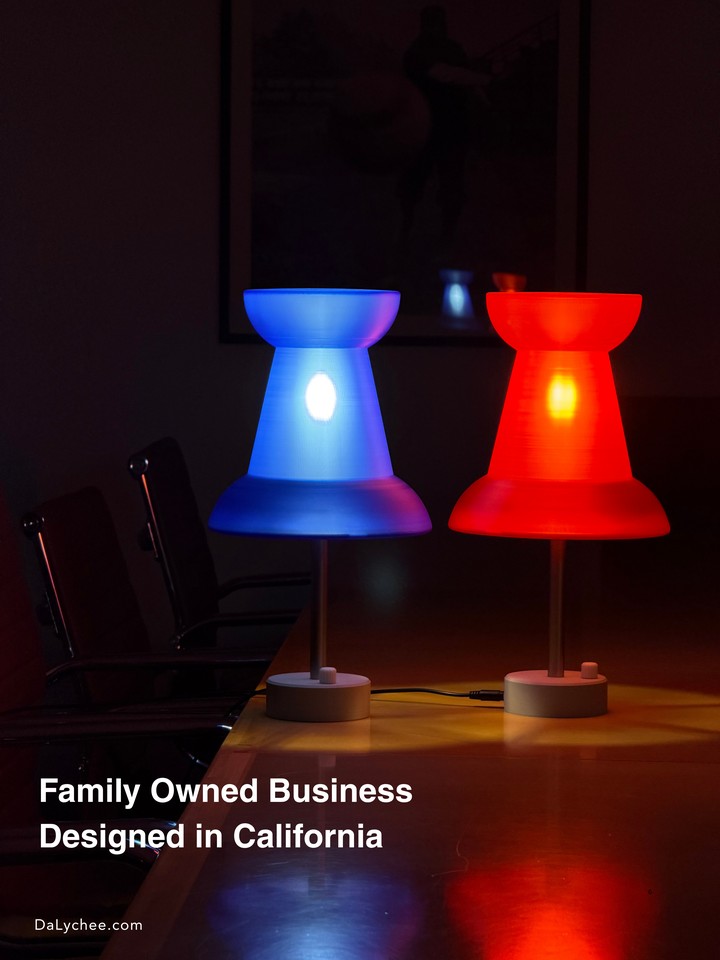 Red and blue Pushpin Lamps glowing above a family-owned business message