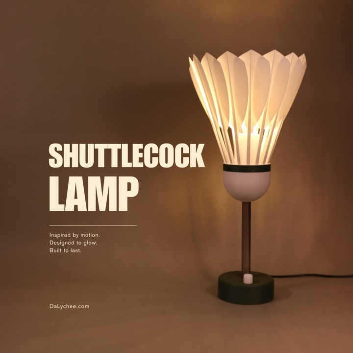 Shuttlecock Lamp illuminated on a warm studio cover